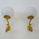 Old pair of wall sconces with carp, brass and globe in white opaline. Year 60