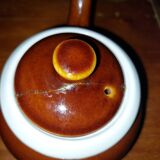 Old used ceramic teapot