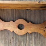 Rustic honey-colored varnished pine shelf