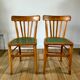 Pair of bistro chairs in light curved wood and green seat 1950s