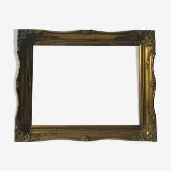 Golden sculpted frame for photo or artwork
