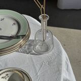 Set of 9 vintage turquoise deep plates with gold trim and pink flowers.