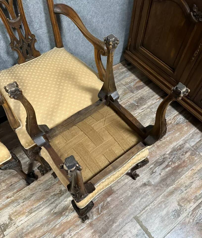 Pair of English armchairs with mahogany footrests circa 1850