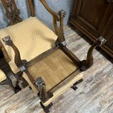 Pair of English armchairs with mahogany footrests circa 1850