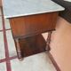 Old wooden marble bedside table