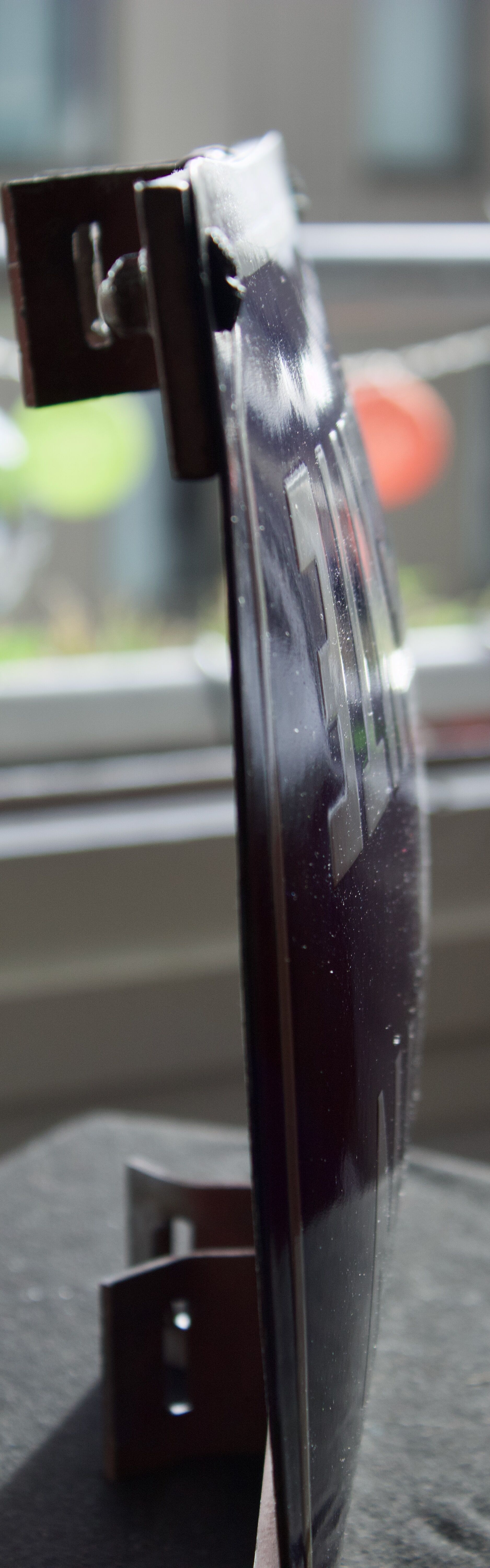 Old Enamelled and bulging "Chemin de la Rente" street plate, in perfect condition, on its cast iron support