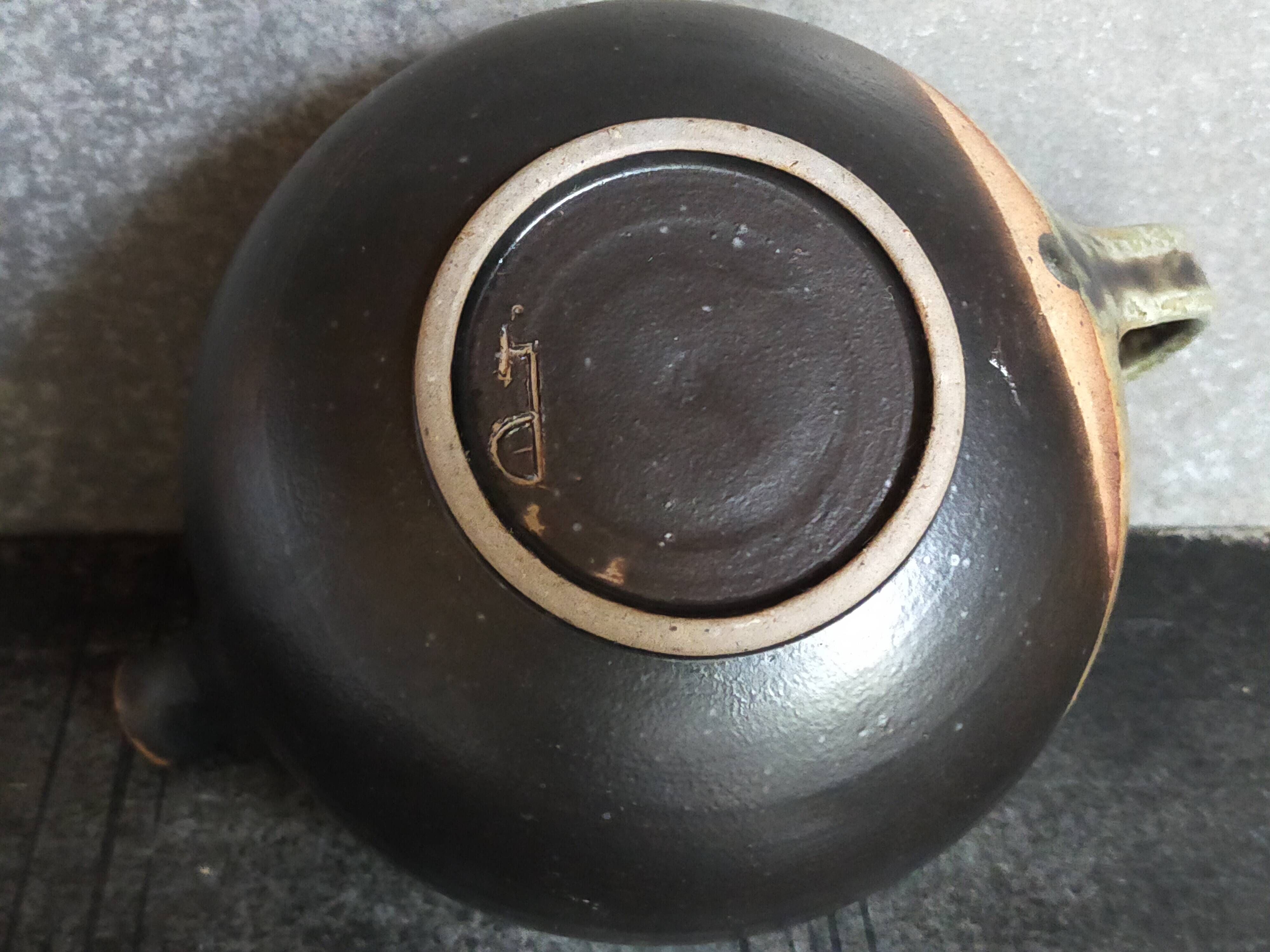 Vintage enameled stoneware potter's teapot