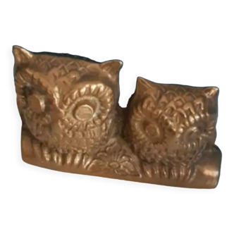 Golden brass owls