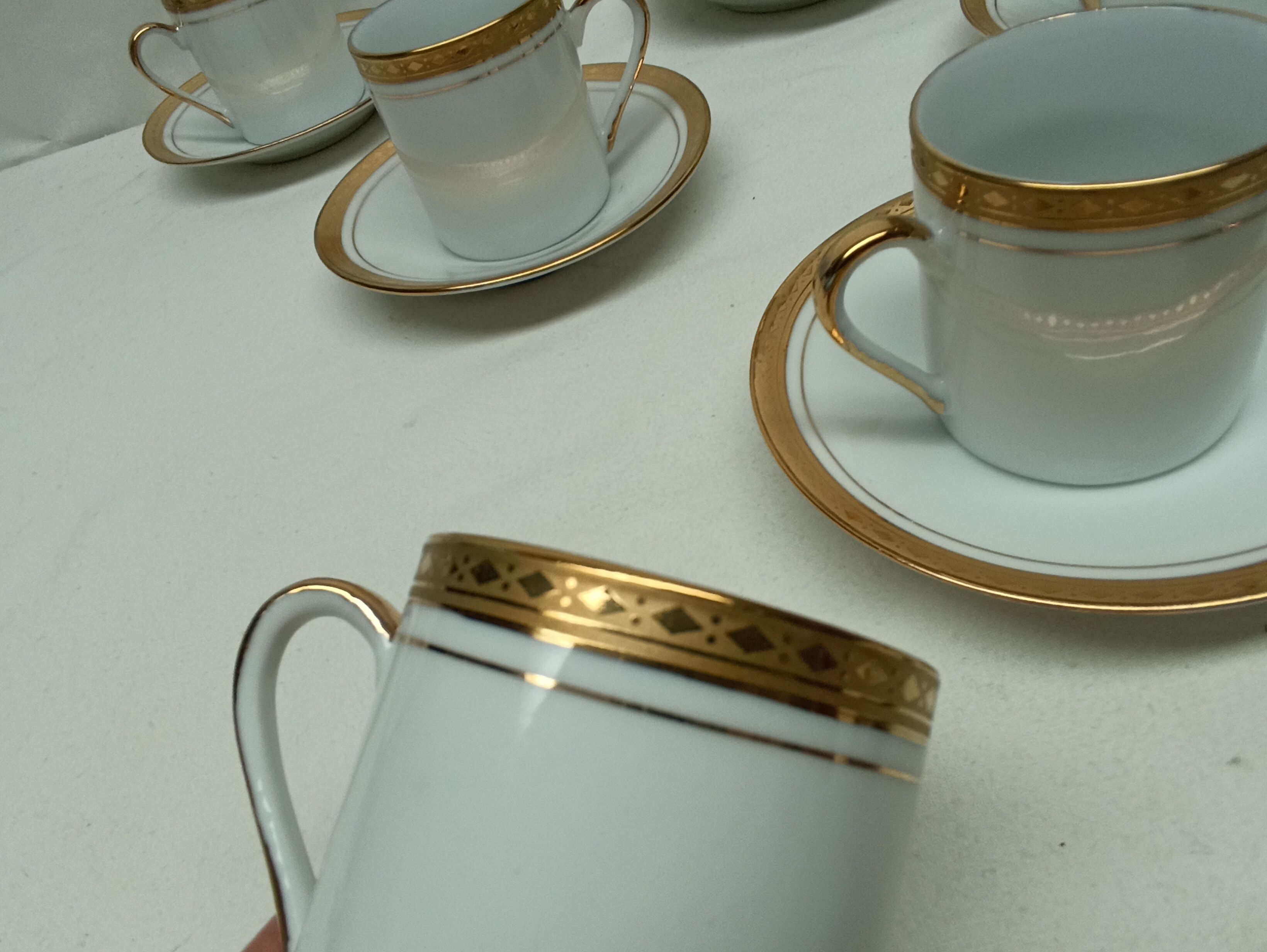 12 cups, porcelain coffee service with 24 carat gold gilding