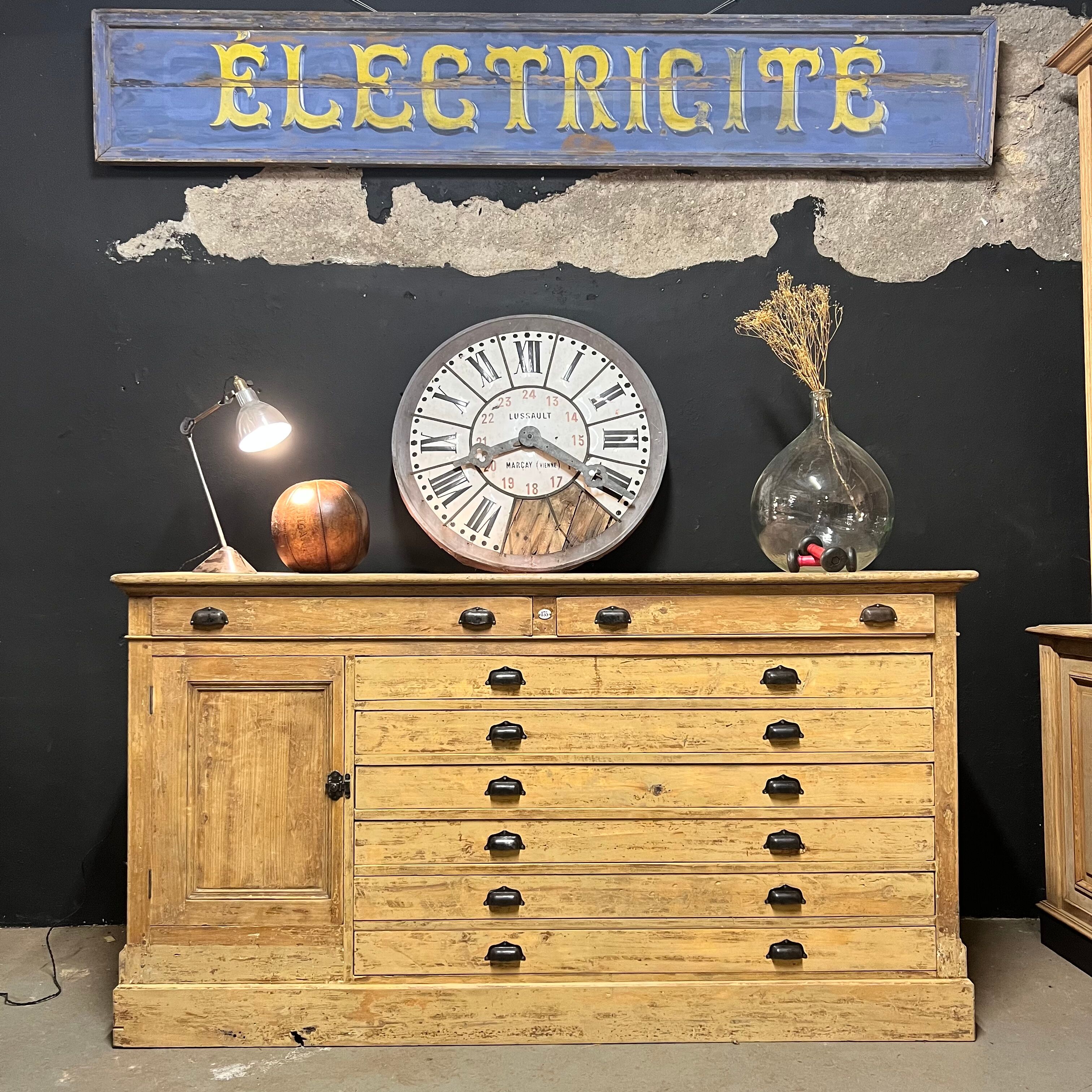 Old piece of furniture by trade with an architect's plan