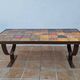 Vintage coffee table "Moulin de la roue" Vallauris in glazed ceramic and forged metal