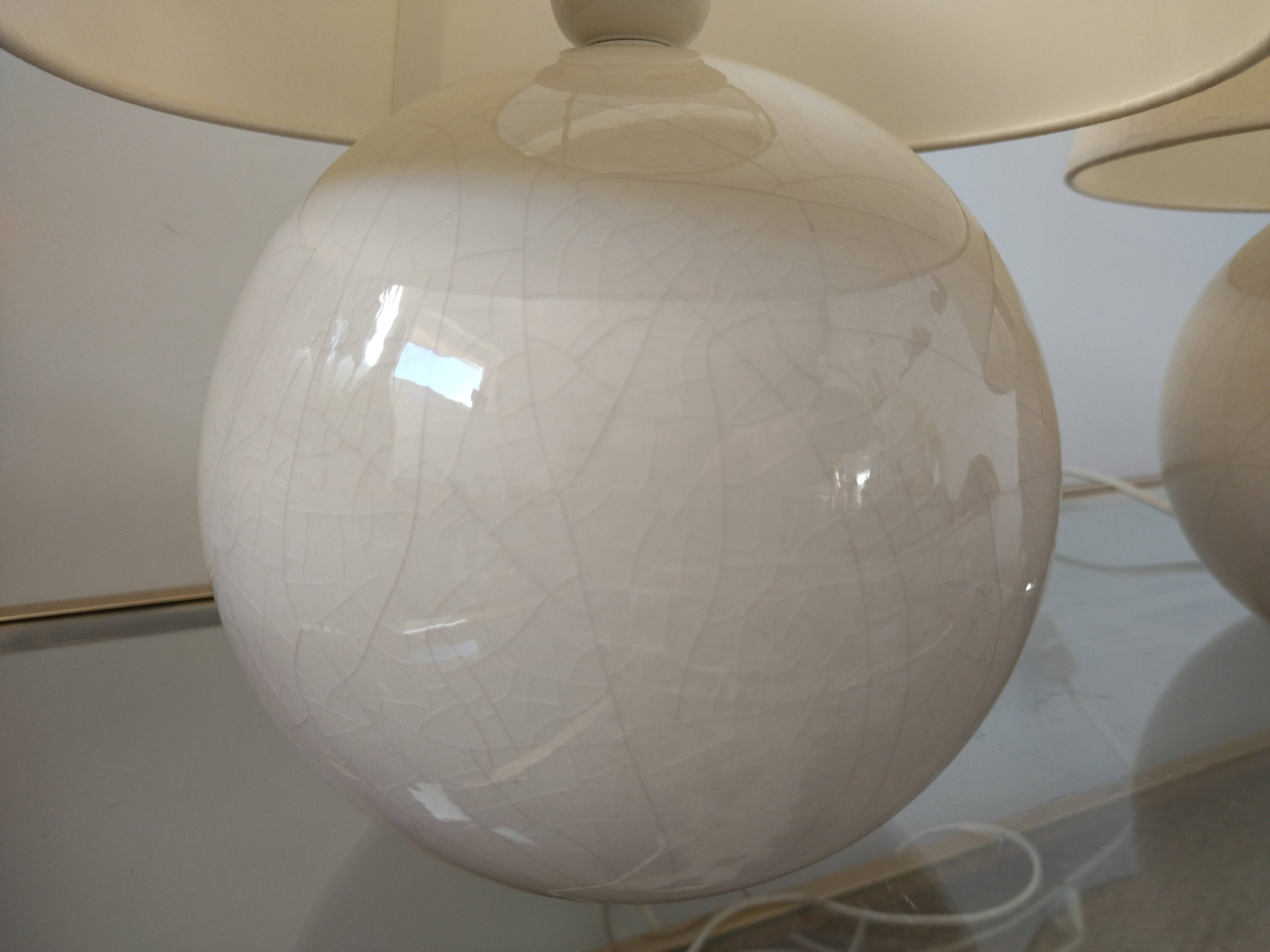 Pair of cracked white Kostka lamps