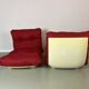 Vintage red shell lounge chairs from the 70s mid-century retro.
