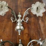 Pair of wall sconces with 2 light arms
