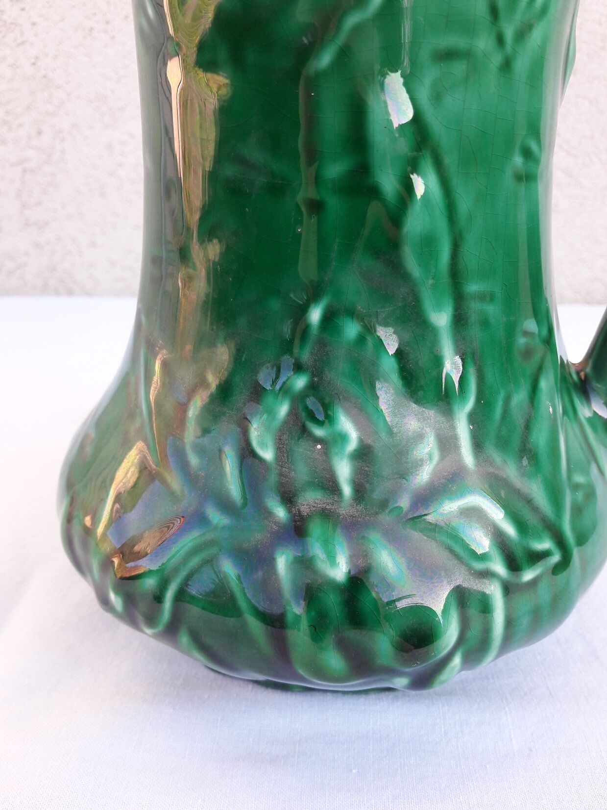 Green ceramic pitcher