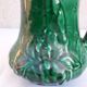 Green ceramic pitcher