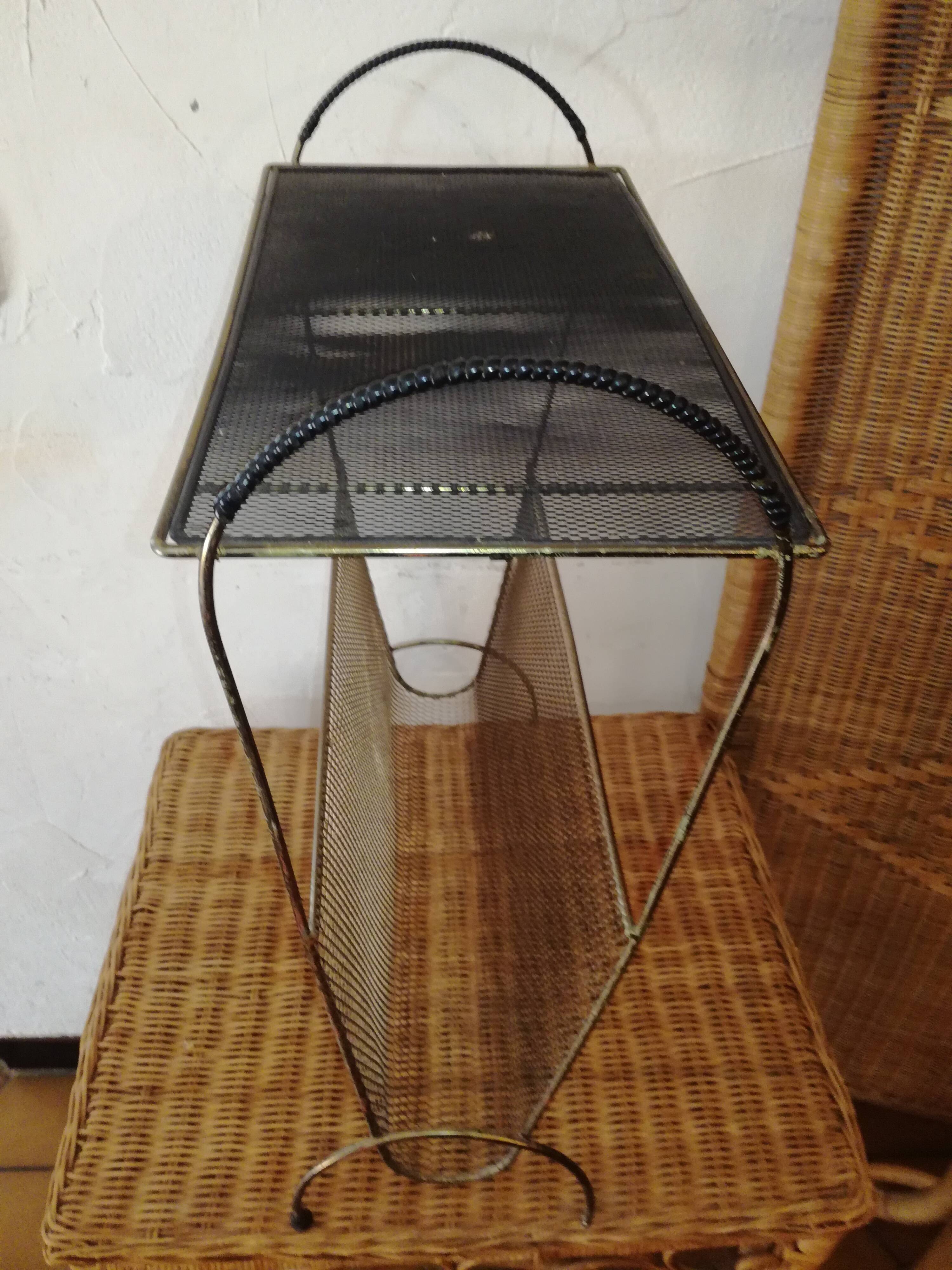 Metal magazine holder