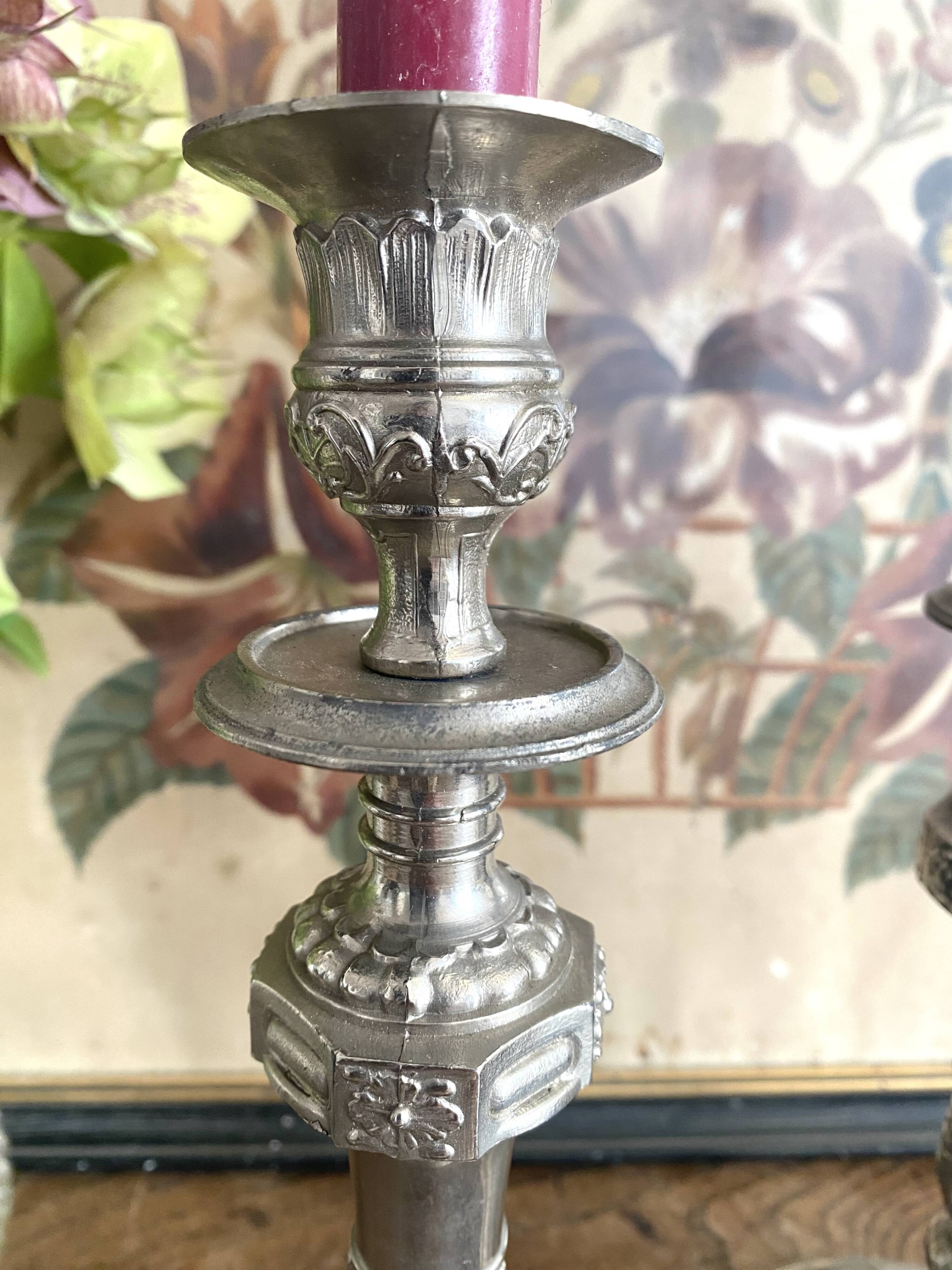 Antique silver-plated metal candlesticks