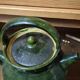 Old green glazed earthenware goat, pottery from Savoie, Broc Verseu.