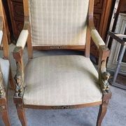 Pair of walnut armchairs in Empire style, Egyptian revival.