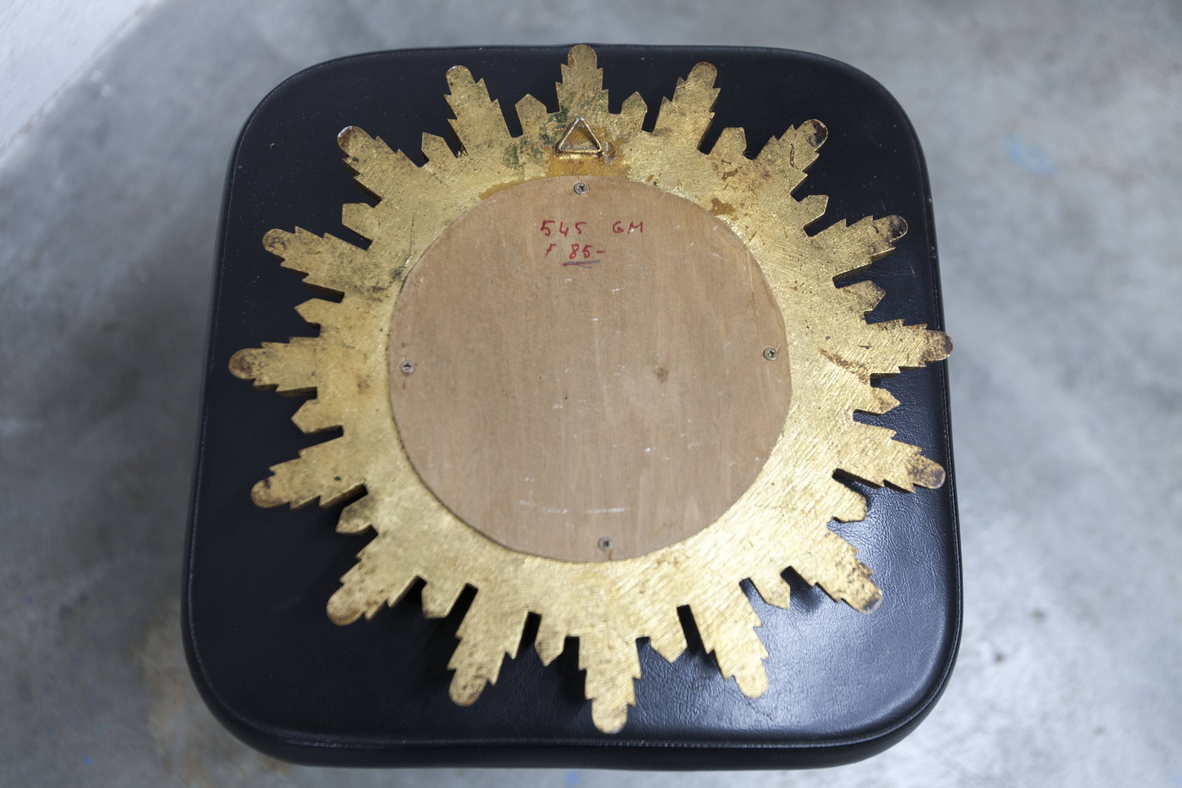 Vintage 1970s convex witch's eye sunburst mirror