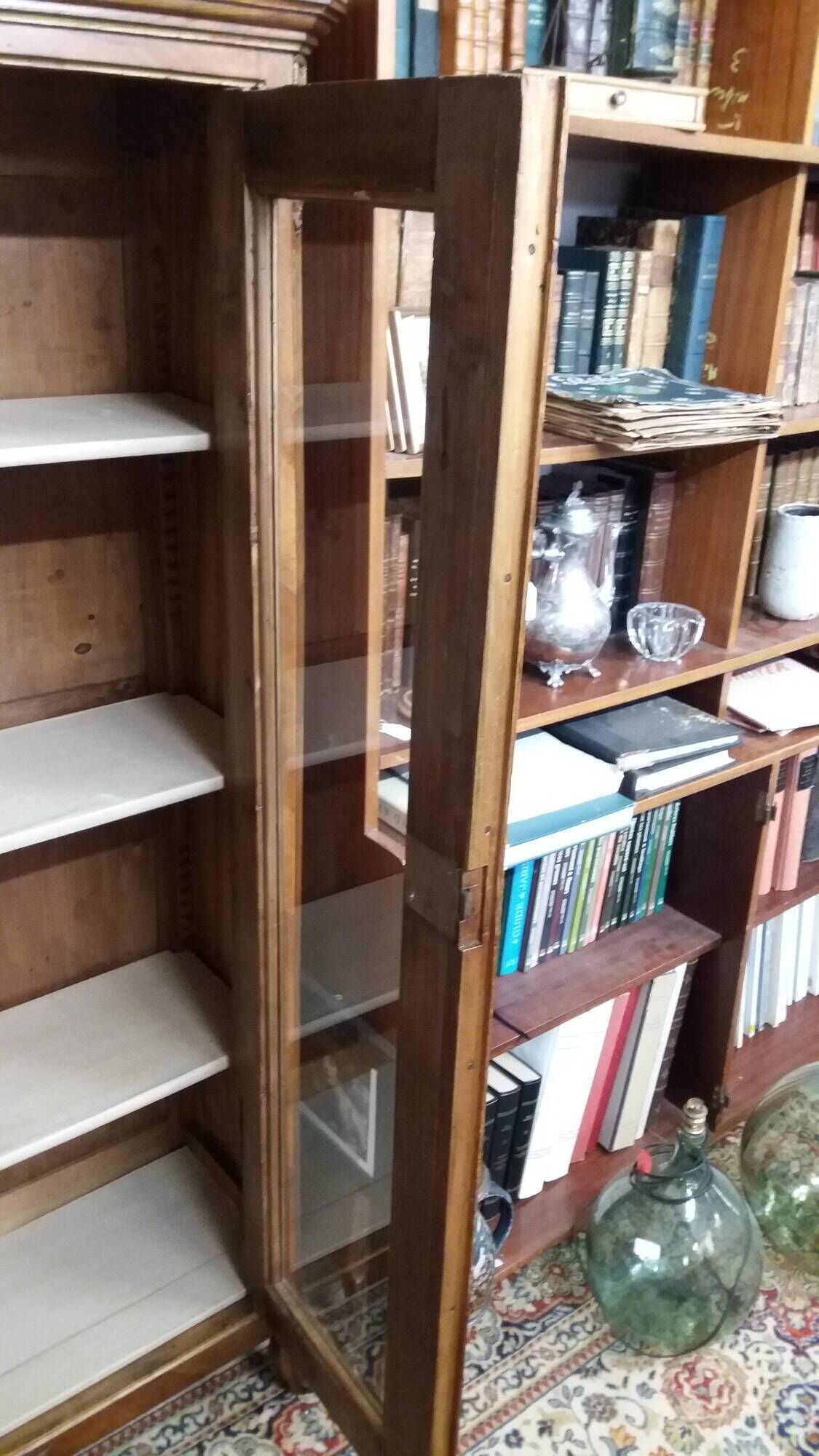 Two-door display cabinet in transitional style.