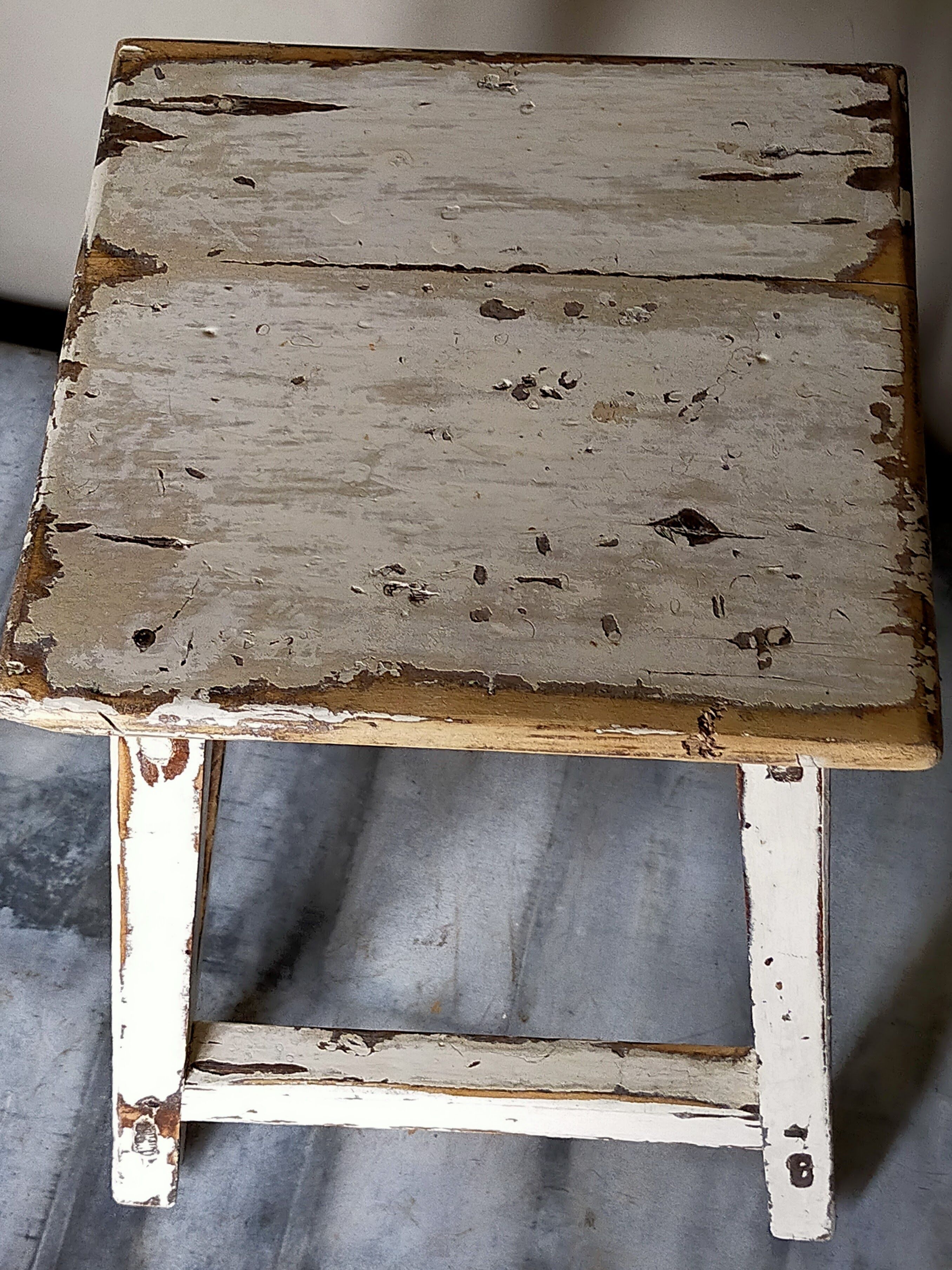 Old patinated workshop stool