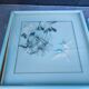Two vintage paintings made with feathers, hummingbird motif