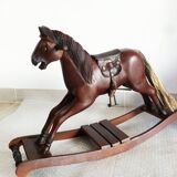 Ancien cheval à bascule en bois et cuir