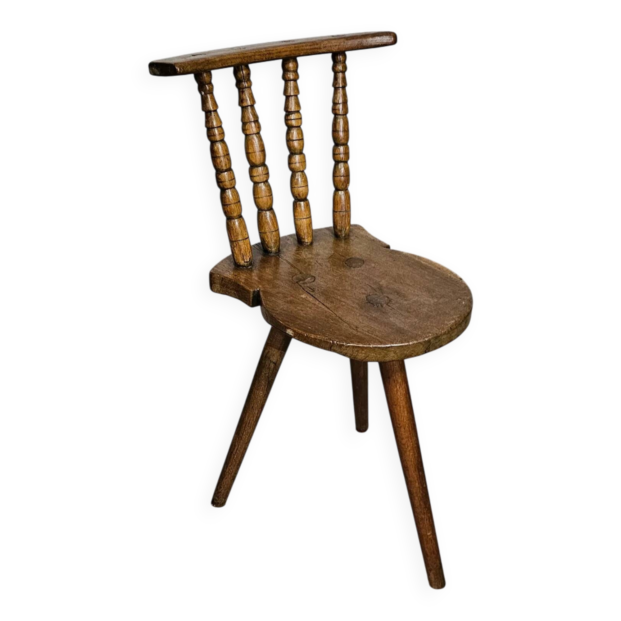 Old farmers tripod chair for decorative use