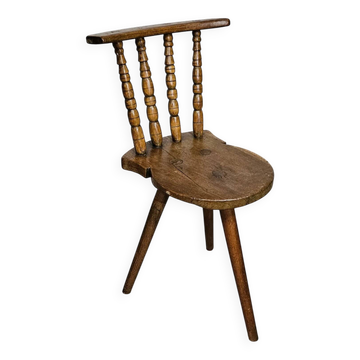 Old farmers tripod chair for decorative use