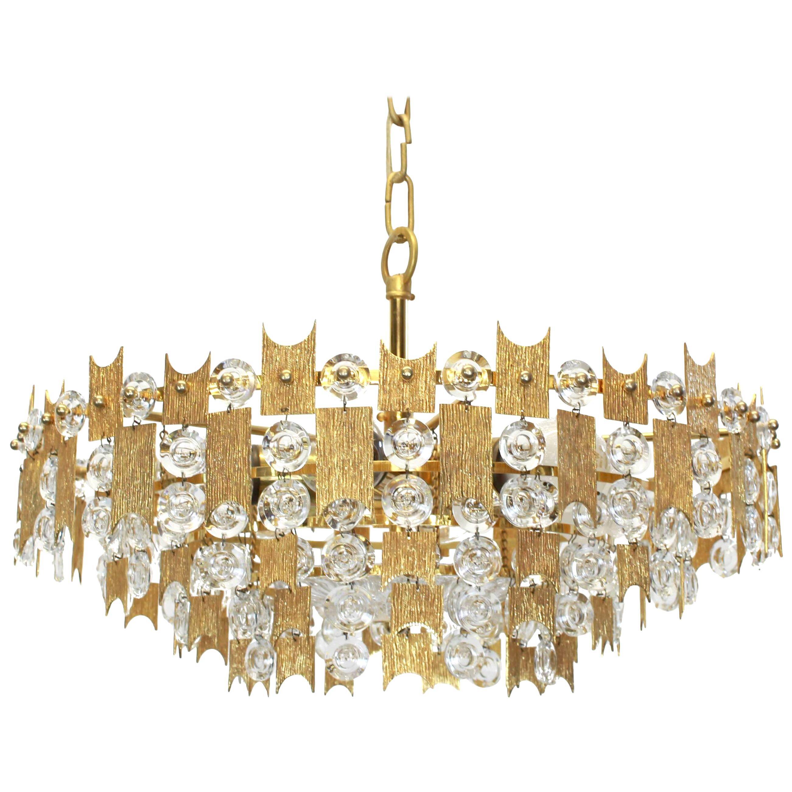 Impressive chandelier in gilded brass and crystal glass by Palwa, Germany, 1960s.