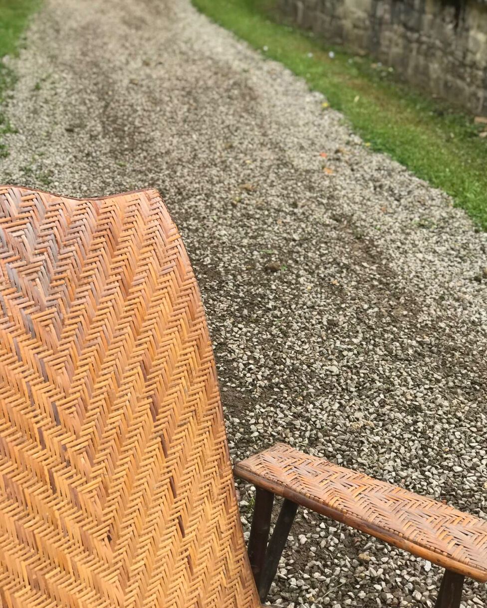 Old rattan lounger.