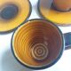 2 Longchamp ceramic coffee cups and saucers
