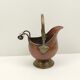 Copper pot cover and a pitcher-style brass handle