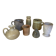 Seven beige and gray ceramic vases