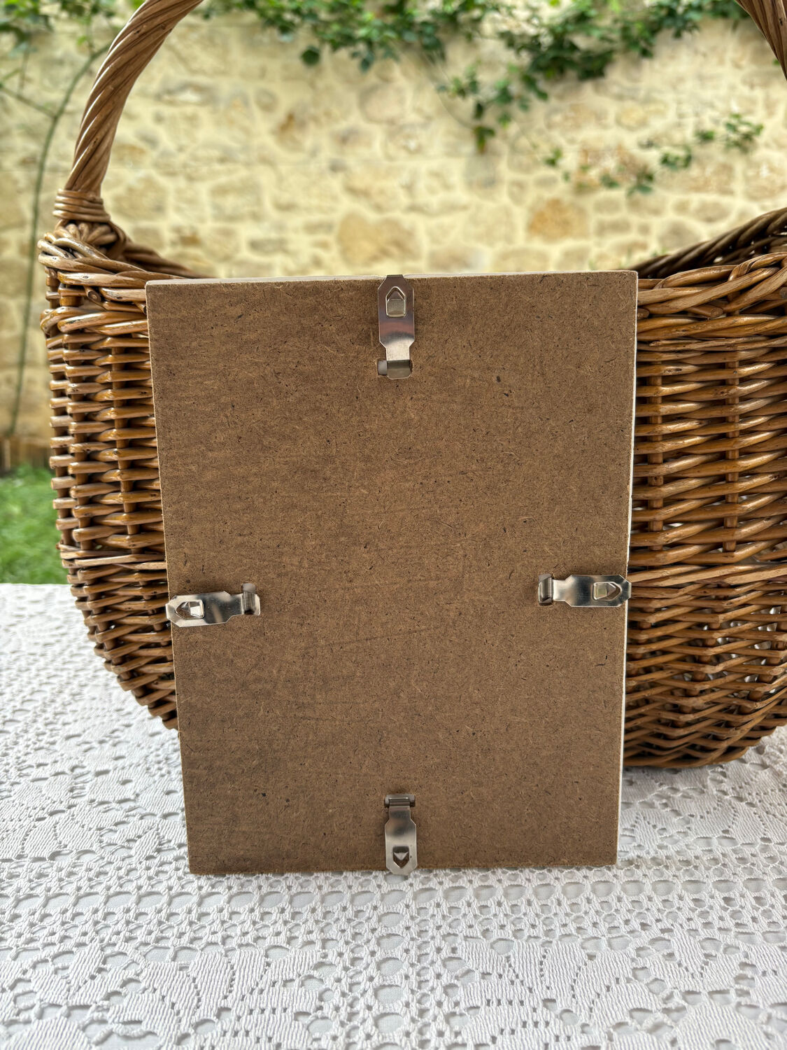 Acrylic painting of flowers in a jug.