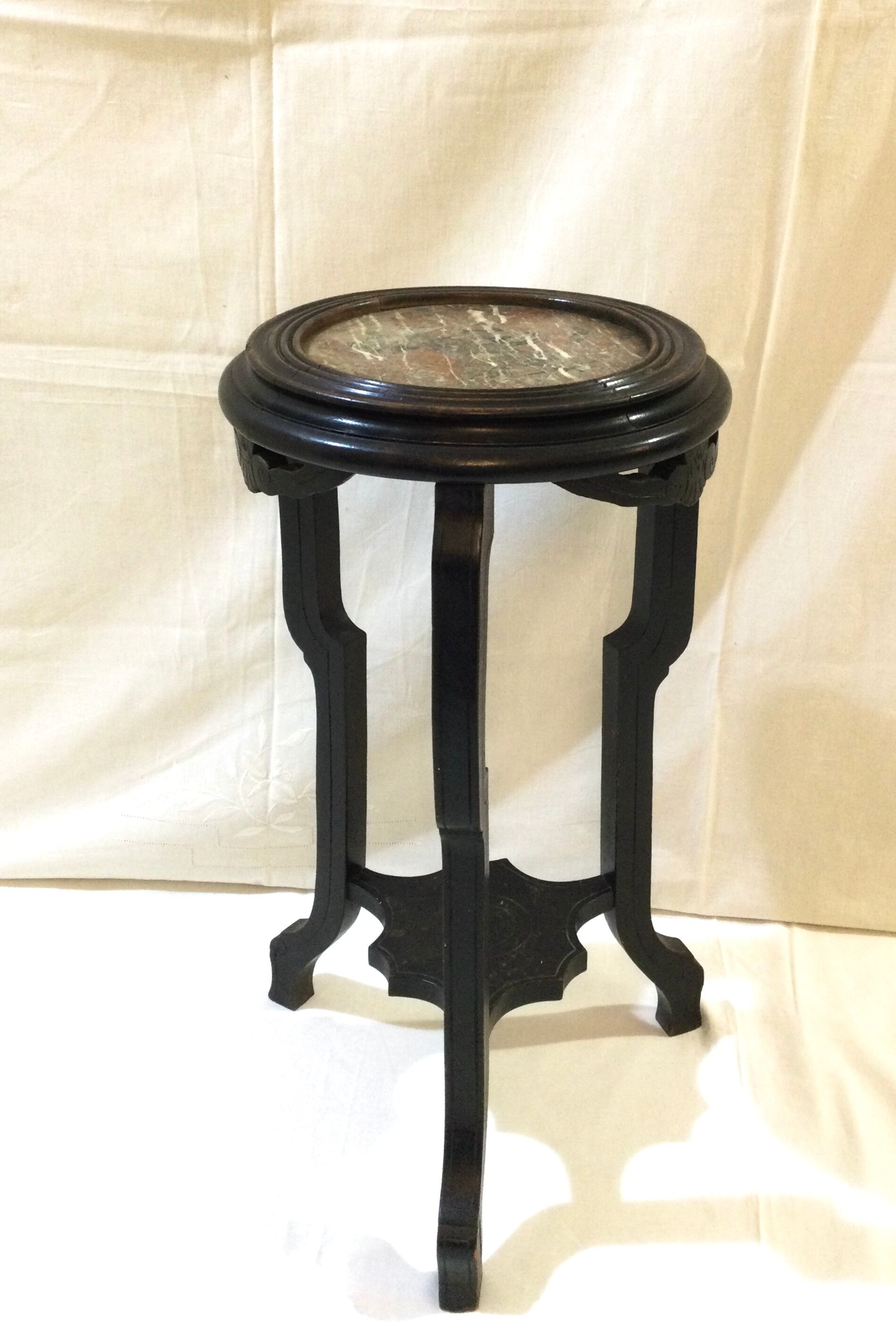 Blackened wooden and marble harness