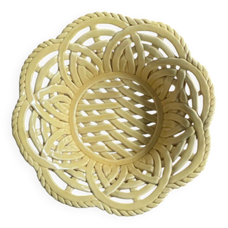 Yellow openwork woven earthenware basket