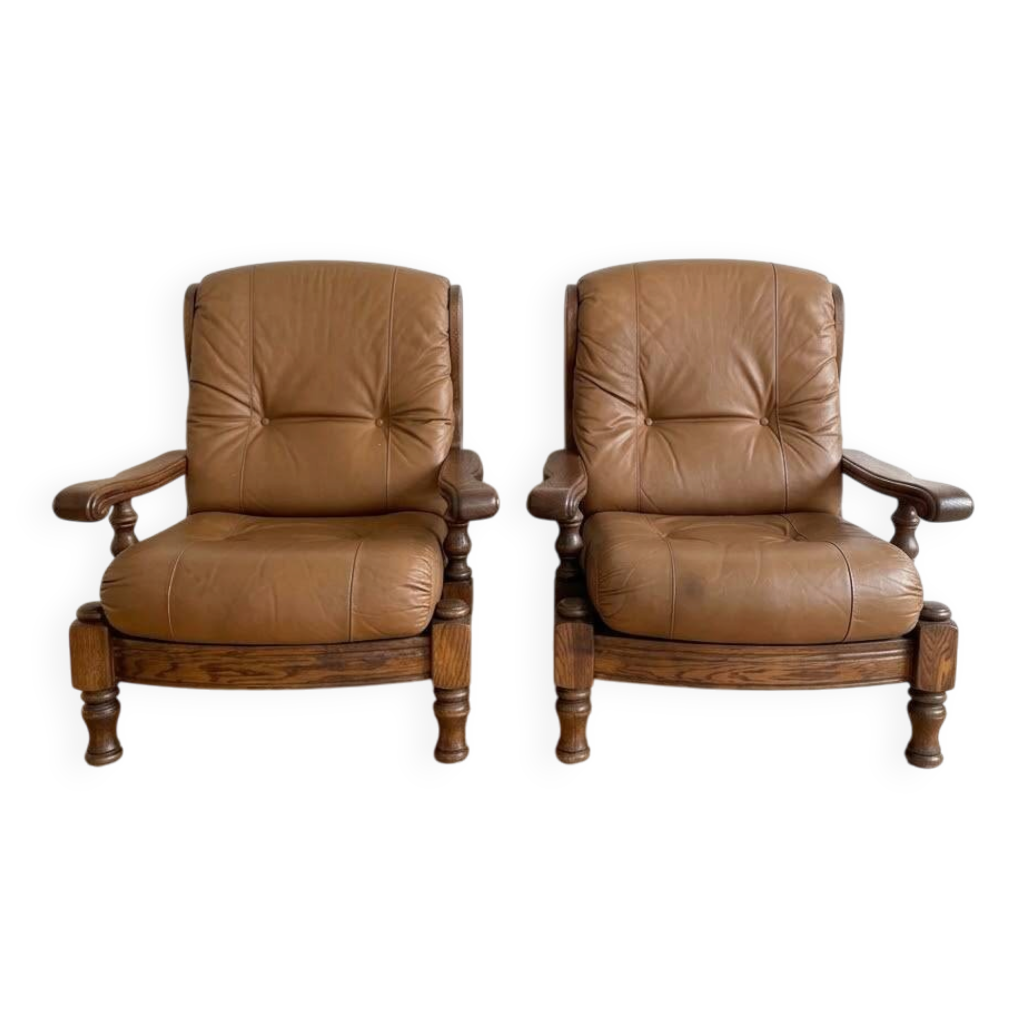 Pair of vintage 1970s armchairs in solid oak and cognac faux leather.