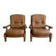Pair of vintage 1970s armchairs in solid oak and cognac faux leather.