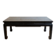 Chinese coffee table in black and gold wood.