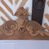 Old sandblasted wooden pediment