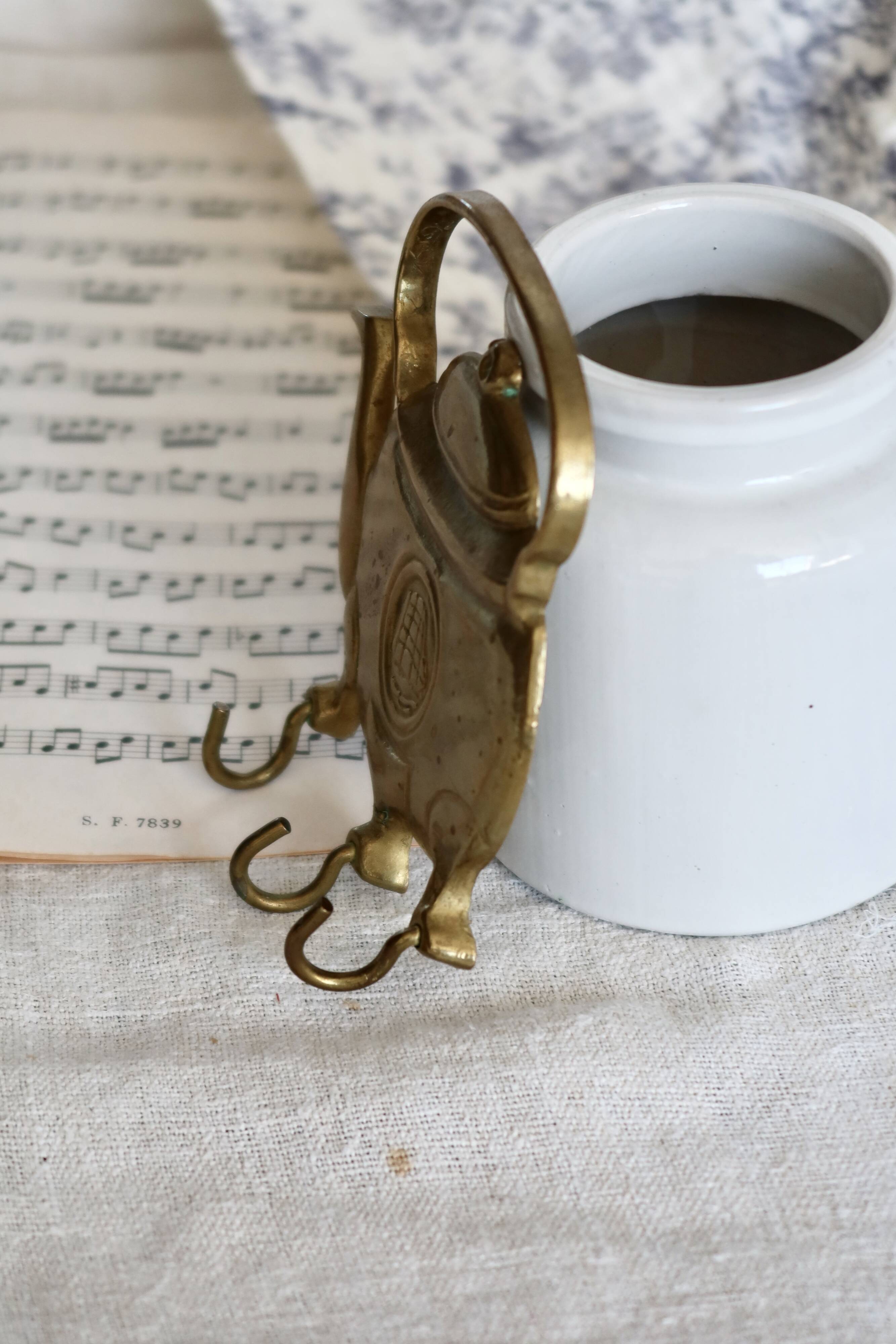 Vintage teapot-shaped brass coat hook