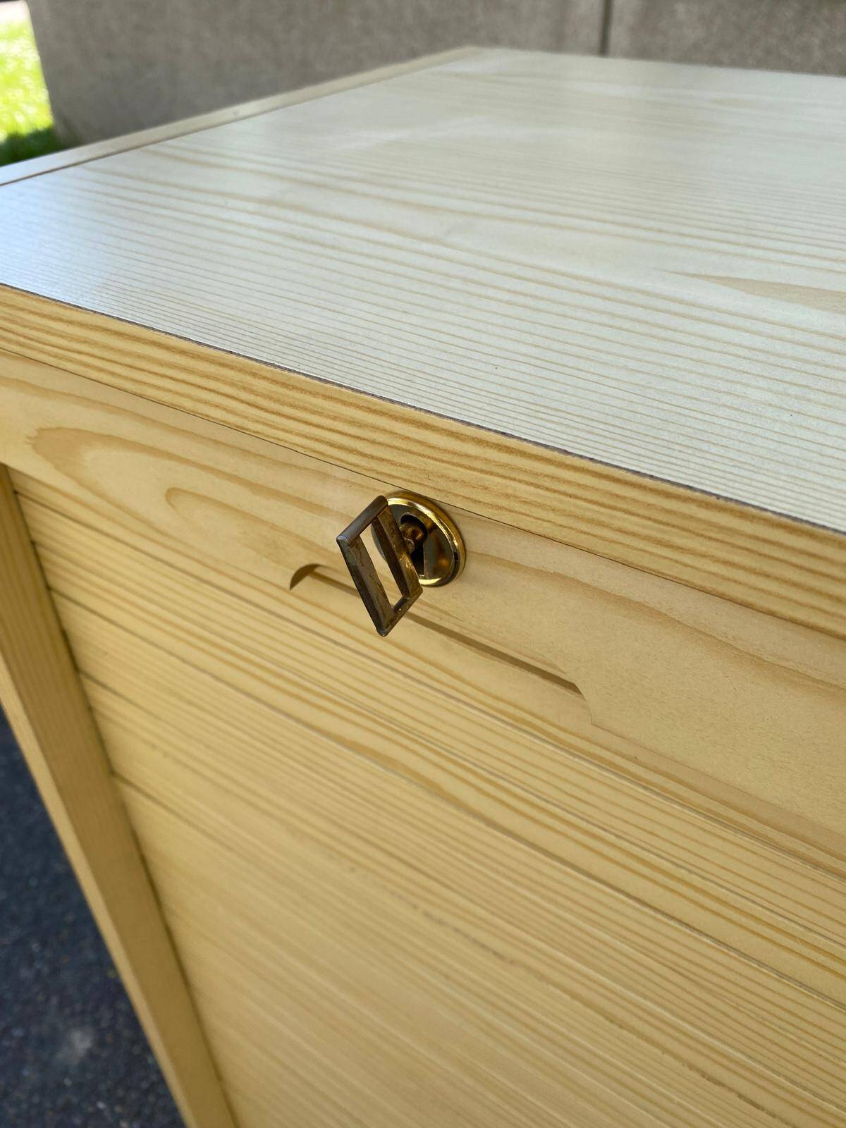 Beige wooden cabinet with curtains or sliding shutters 120cm