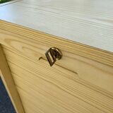 Beige wooden cabinet with curtains or sliding shutters 120cm