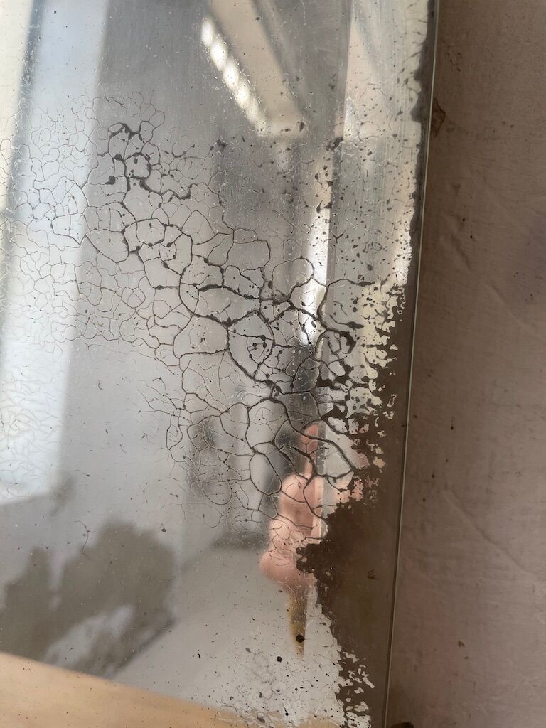 Very stung old bevelled mirror 39x60cm