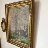 Old oil on canvas, wooded landscape with house, gilded frame.