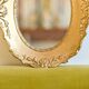 Miroir ovale doré vintage à moulures fleuries