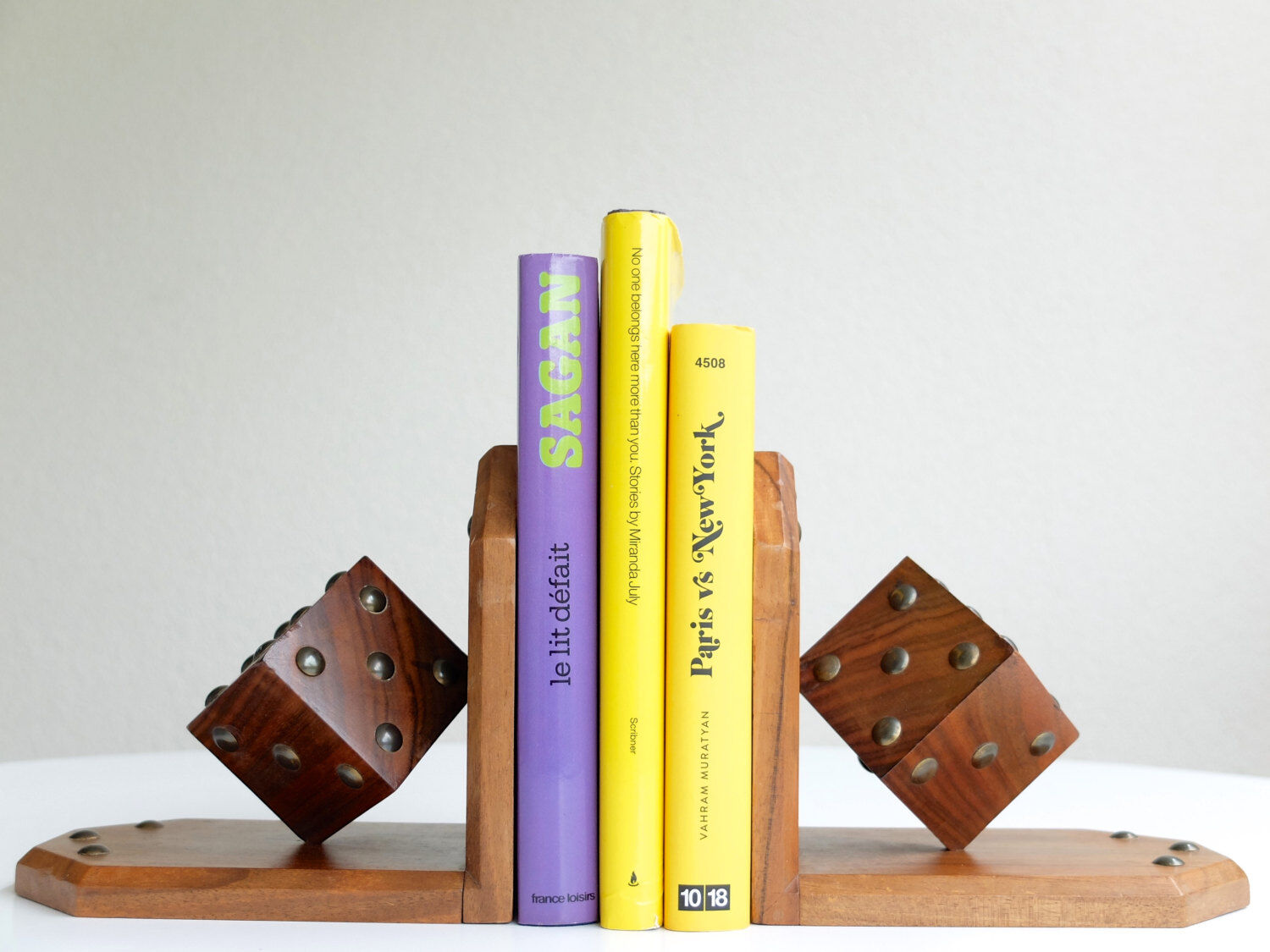 "In" wooden bookends studded, 50's